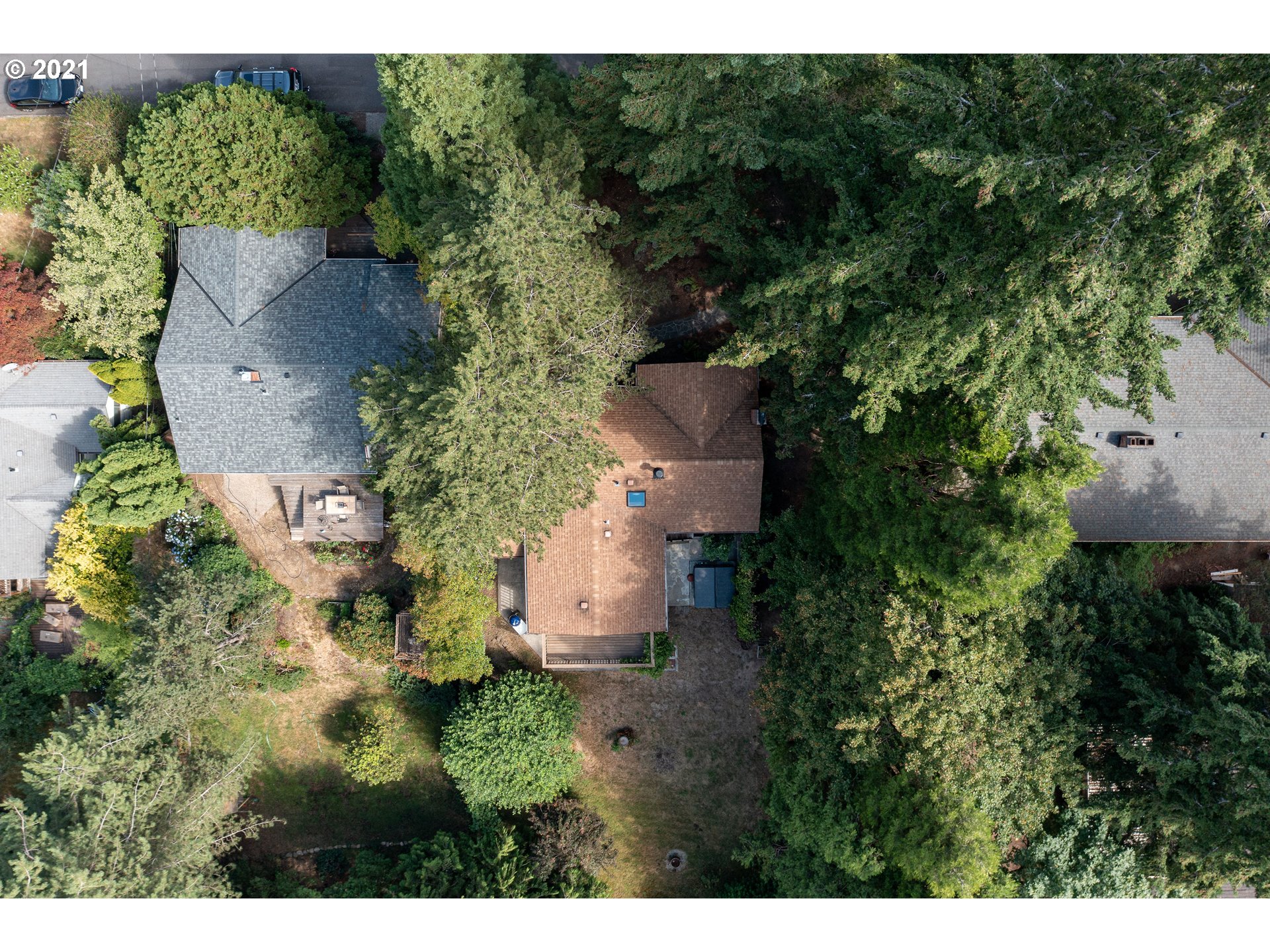 3740 Southwest Caldew Street Portland, OR 97219 - Photo 28 of 28 an aerial view of a house with a yard