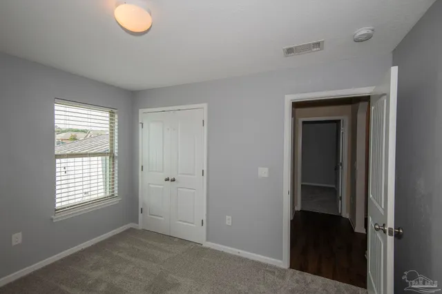 an empty room that has a window