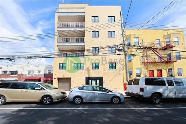 a car parked in front of a building