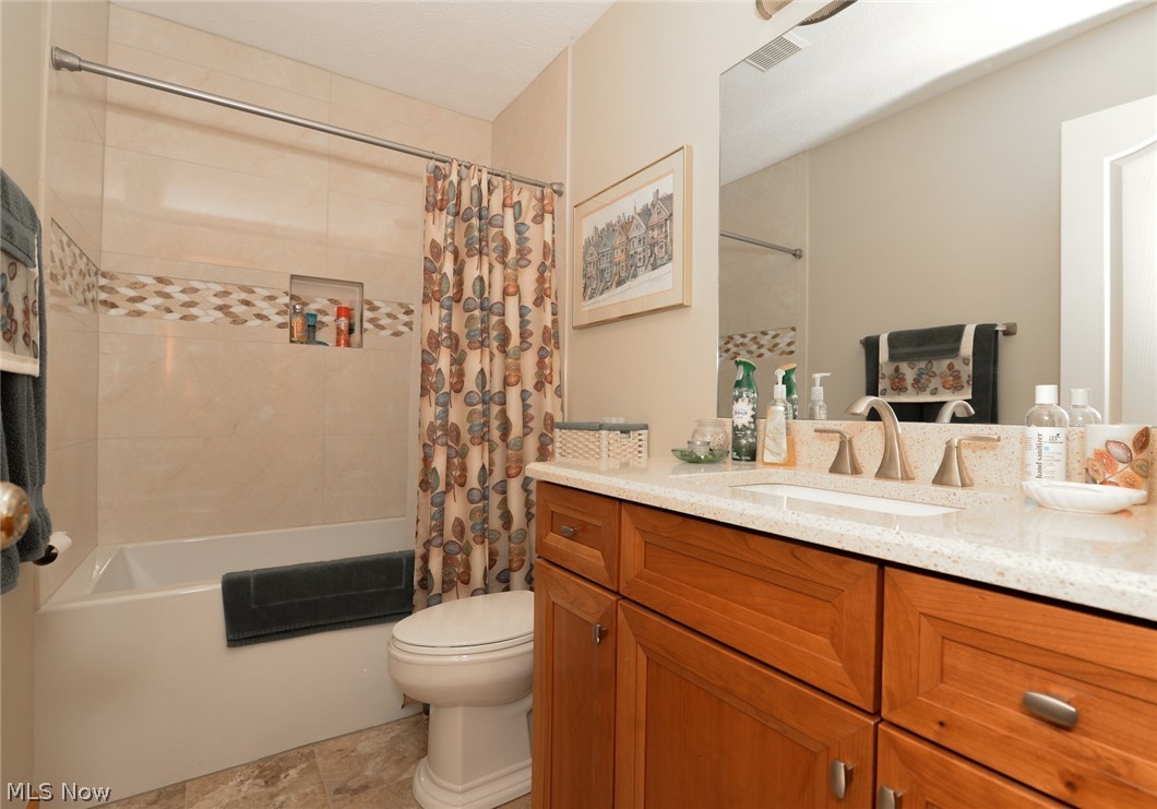 4490 Fenn Road Medina, OH 44256 - Photo 22 of 35 The upper level features 2 bedrooms and a updated full bath.