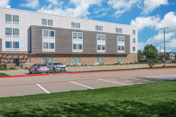 a large room with gym equipment