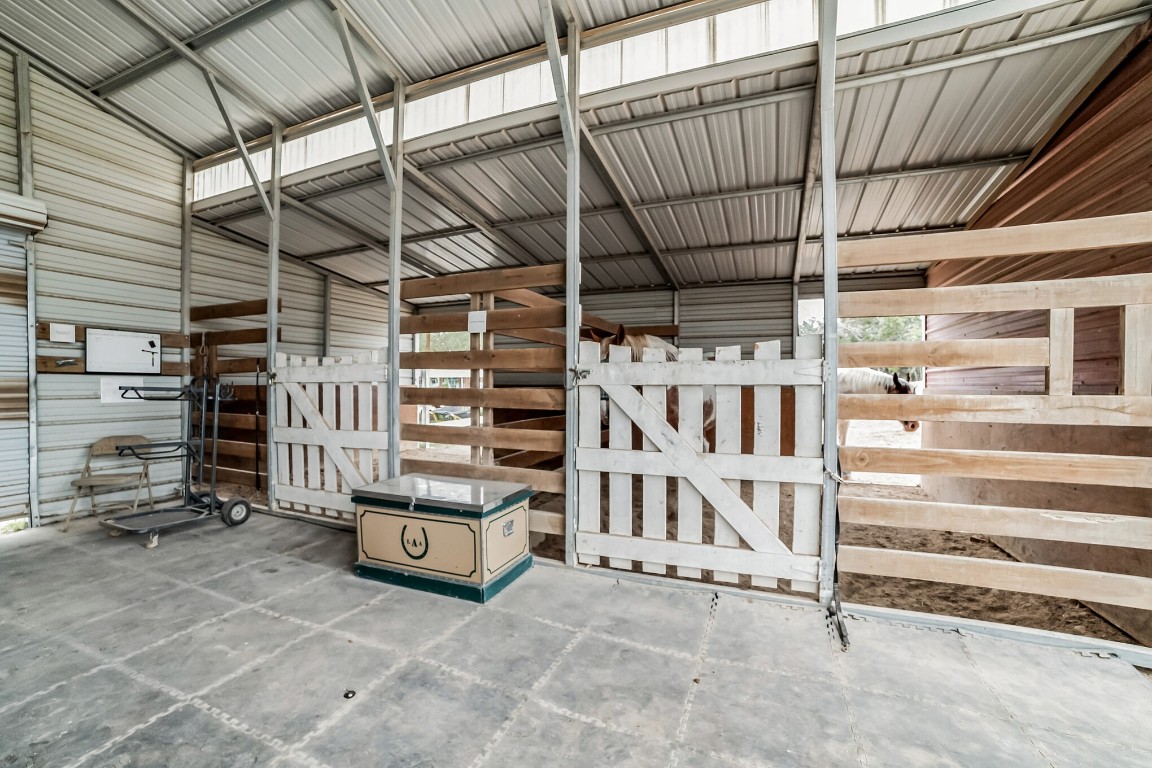 17008 Trails End Road Leander, TX 78641 - Photo 23 of 26 a view of an empty room with racks on the wall