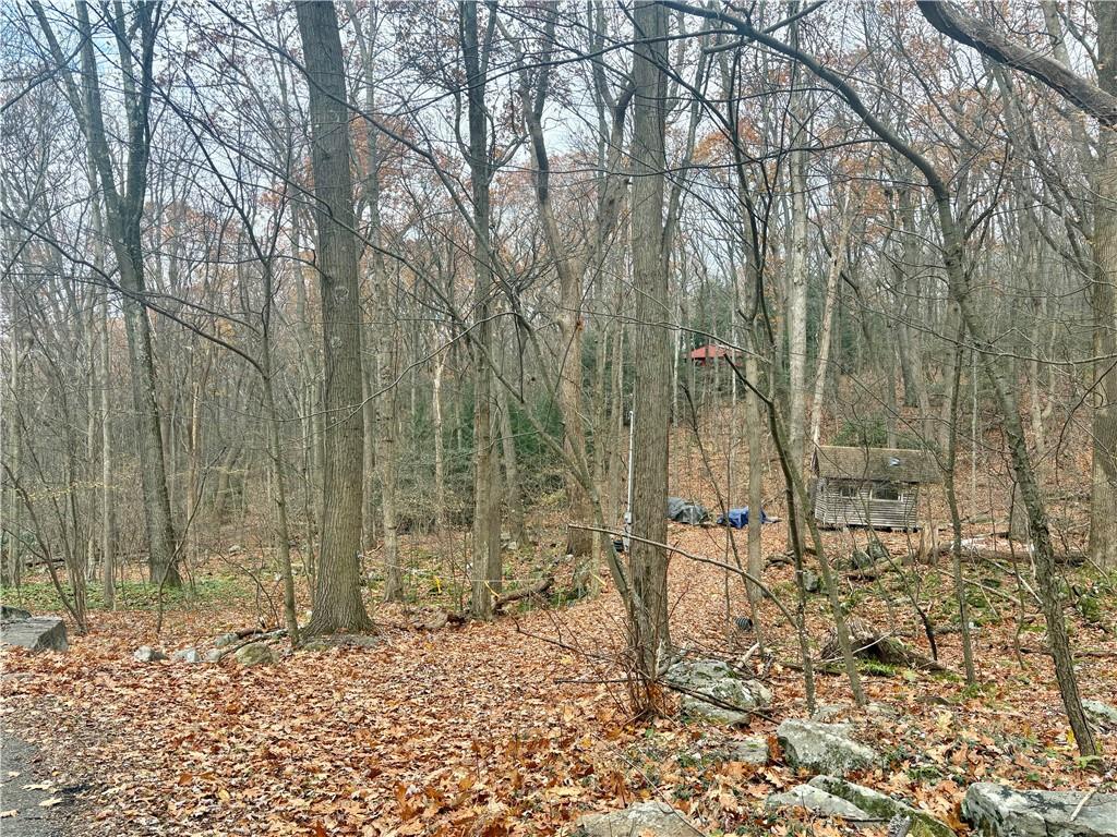 150 Maple Road Acme, PA 15610 - Photo 2 of 10 a backyard of a house with lots of green space