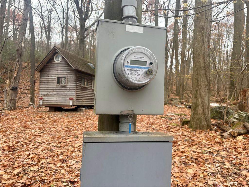 150 Maple Road Acme, PA 15610 - Photo 6 of 10 a view of a house with a fountain and a fire pit