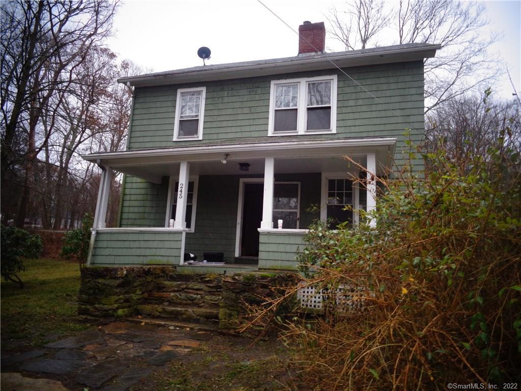 245 Westcott Road Killingly, CT 06239 - Photo 1 of 1 a front view of a house with garden