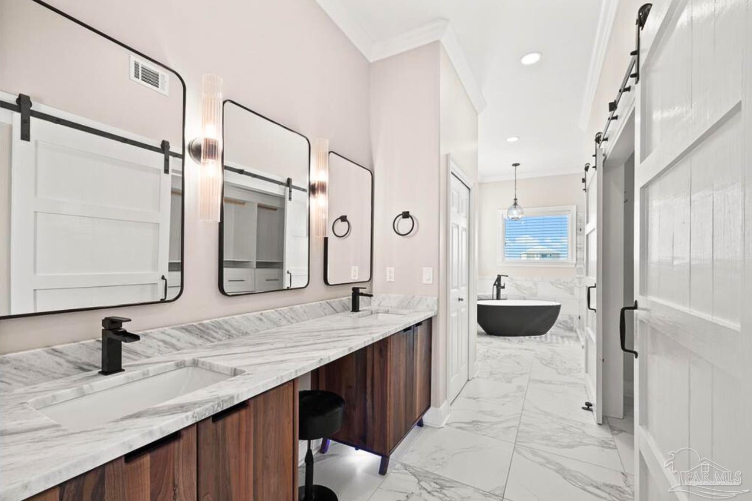 321 Gulfview Lane Perdido Key, FL 32507 - Photo 6 of 57 a spacious bathroom with a granite countertop sink mirror and bathtub