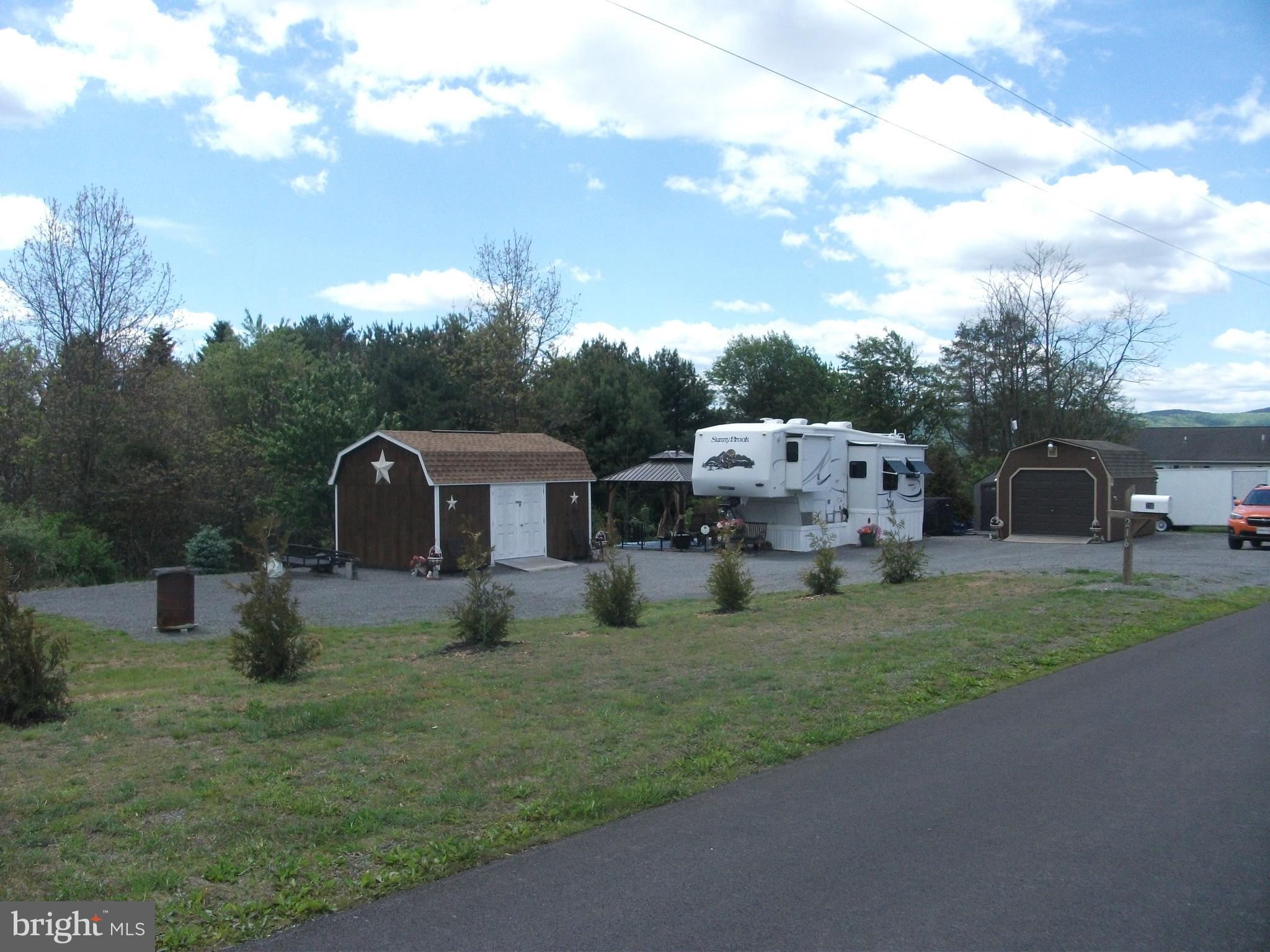 216 Garland Road Needmore, PA 17238 - Photo 36 of 38 a front view of house with yard and green space