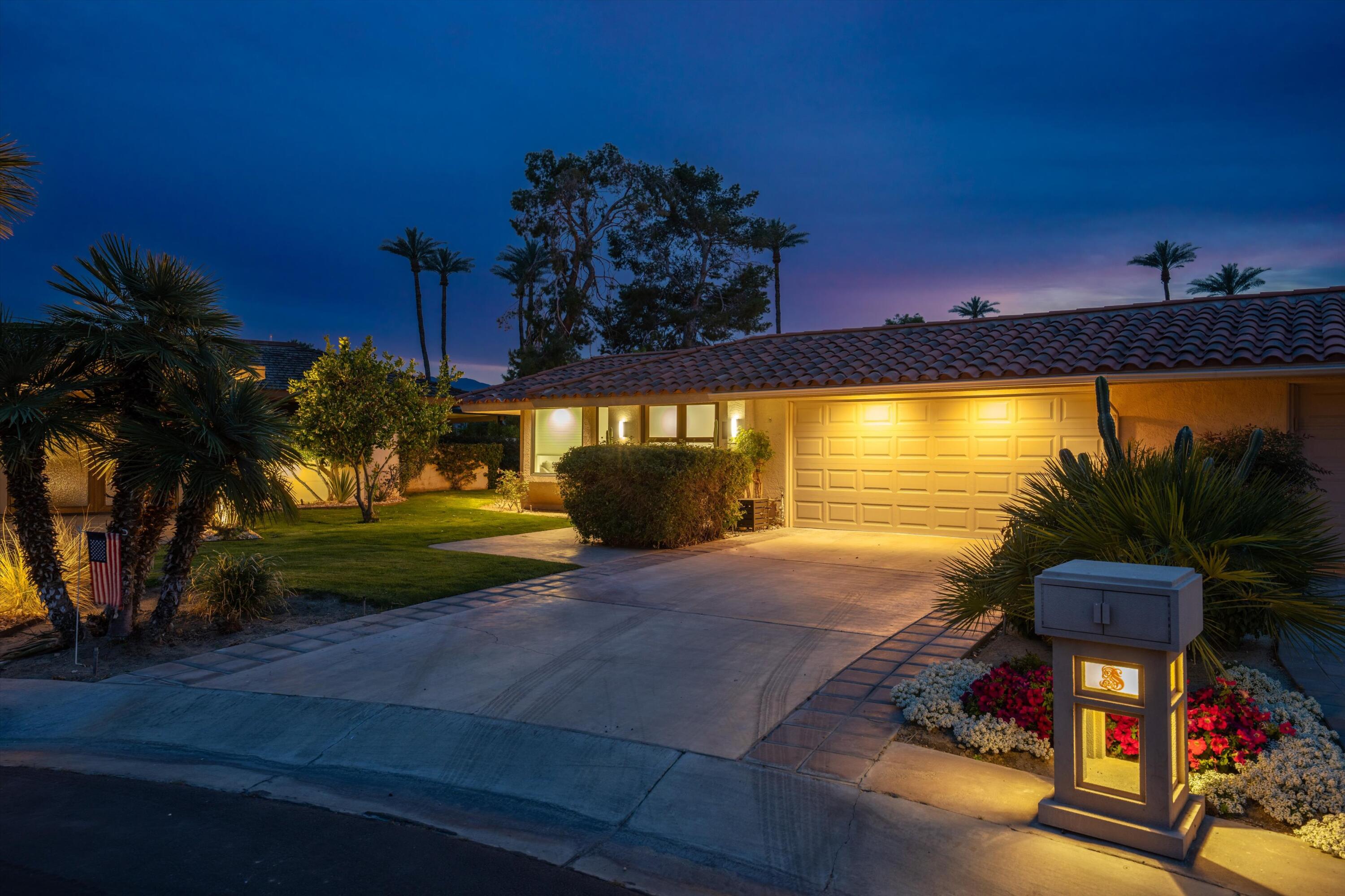 7 Wake Forest Court Rancho Mirage, CA 92270 - Photo 1 of 60 a view of a swimming pool with an outdoor space and seating area