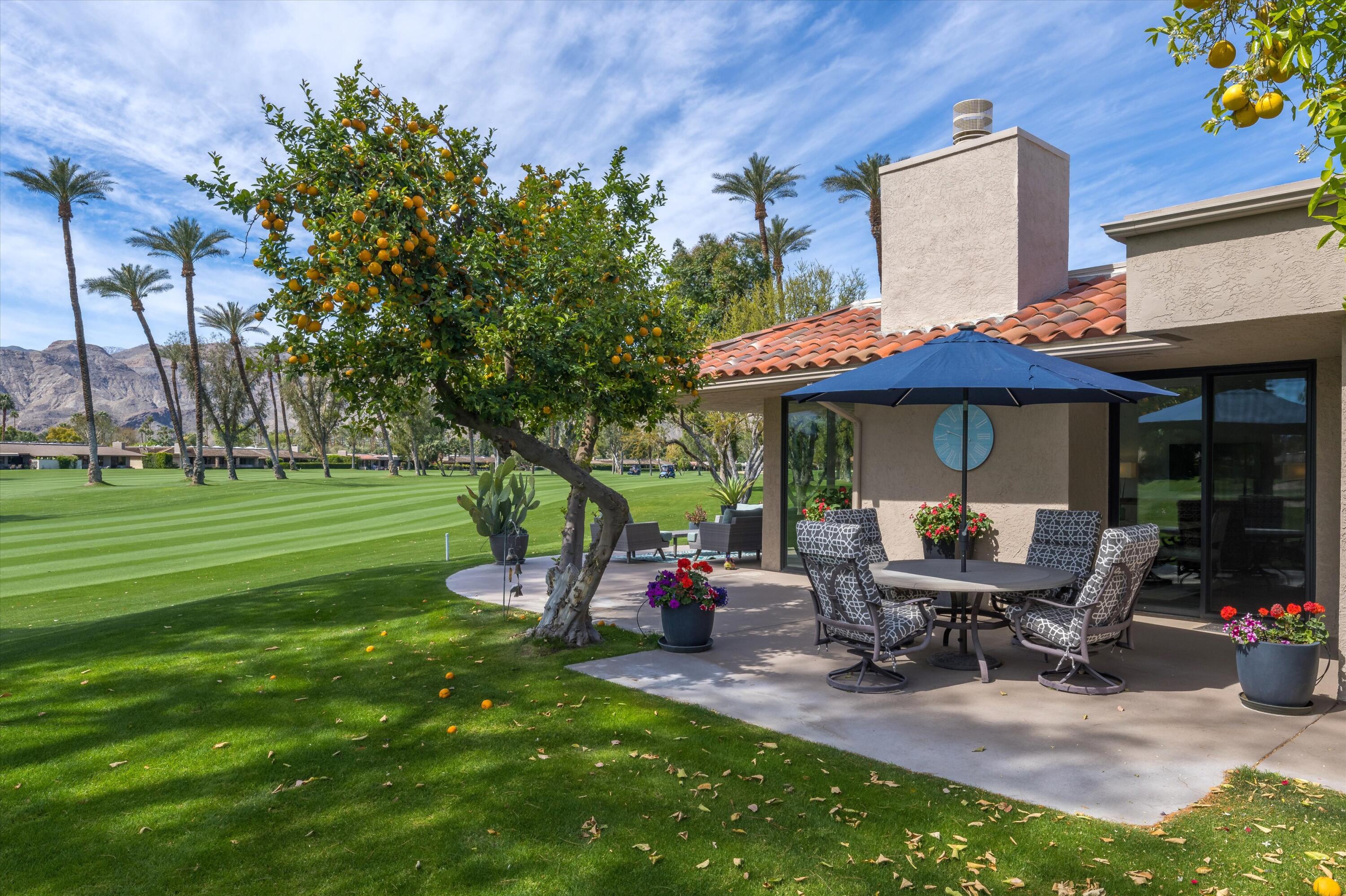 7 Wake Forest Court Rancho Mirage, CA 92270 - Photo 19 of 60 a view of a house with backyard porch and sitting area