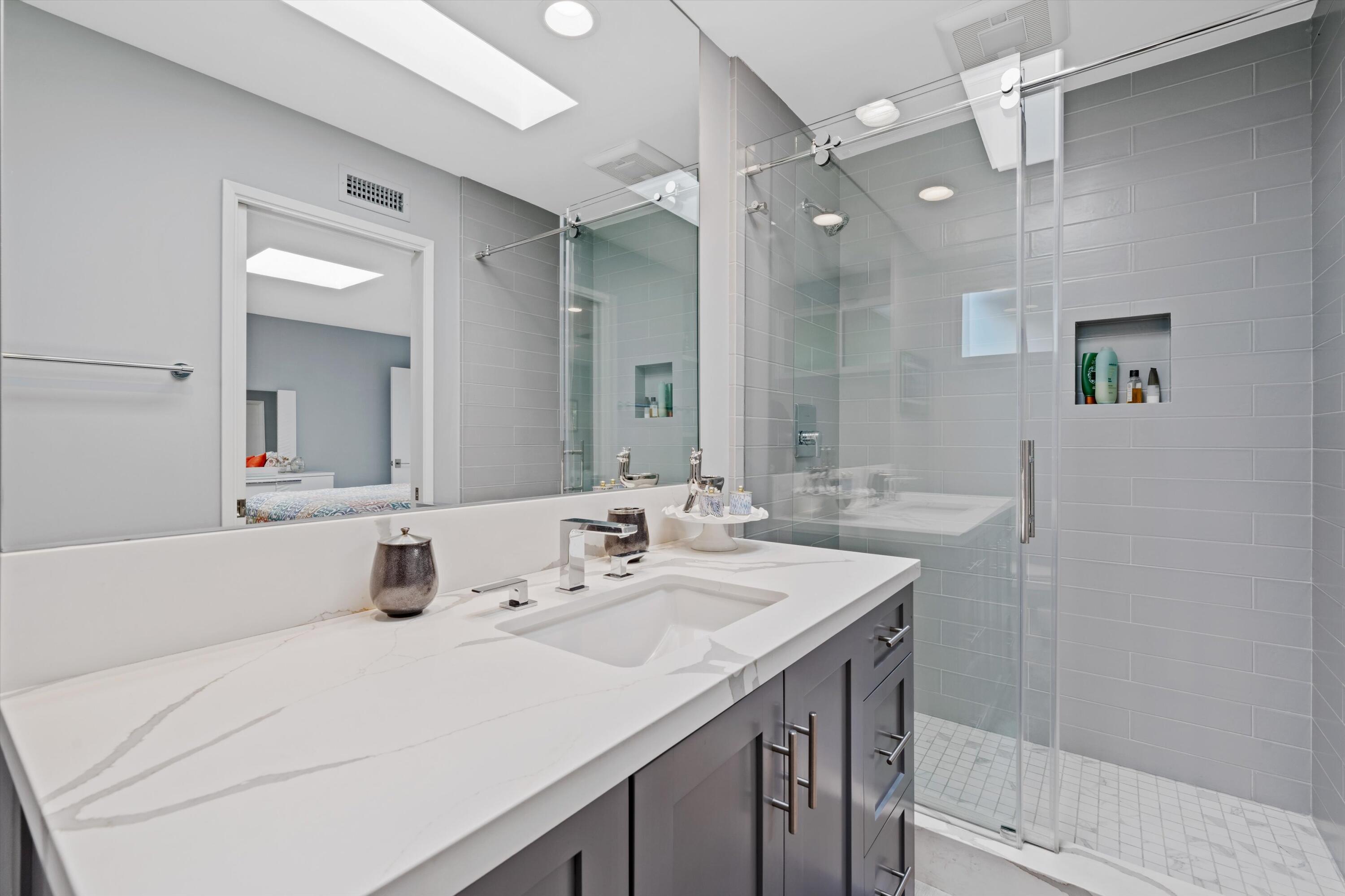 7 Wake Forest Court Rancho Mirage, CA 92270 - Photo 31 of 60 a bathroom with a sink and a mirror