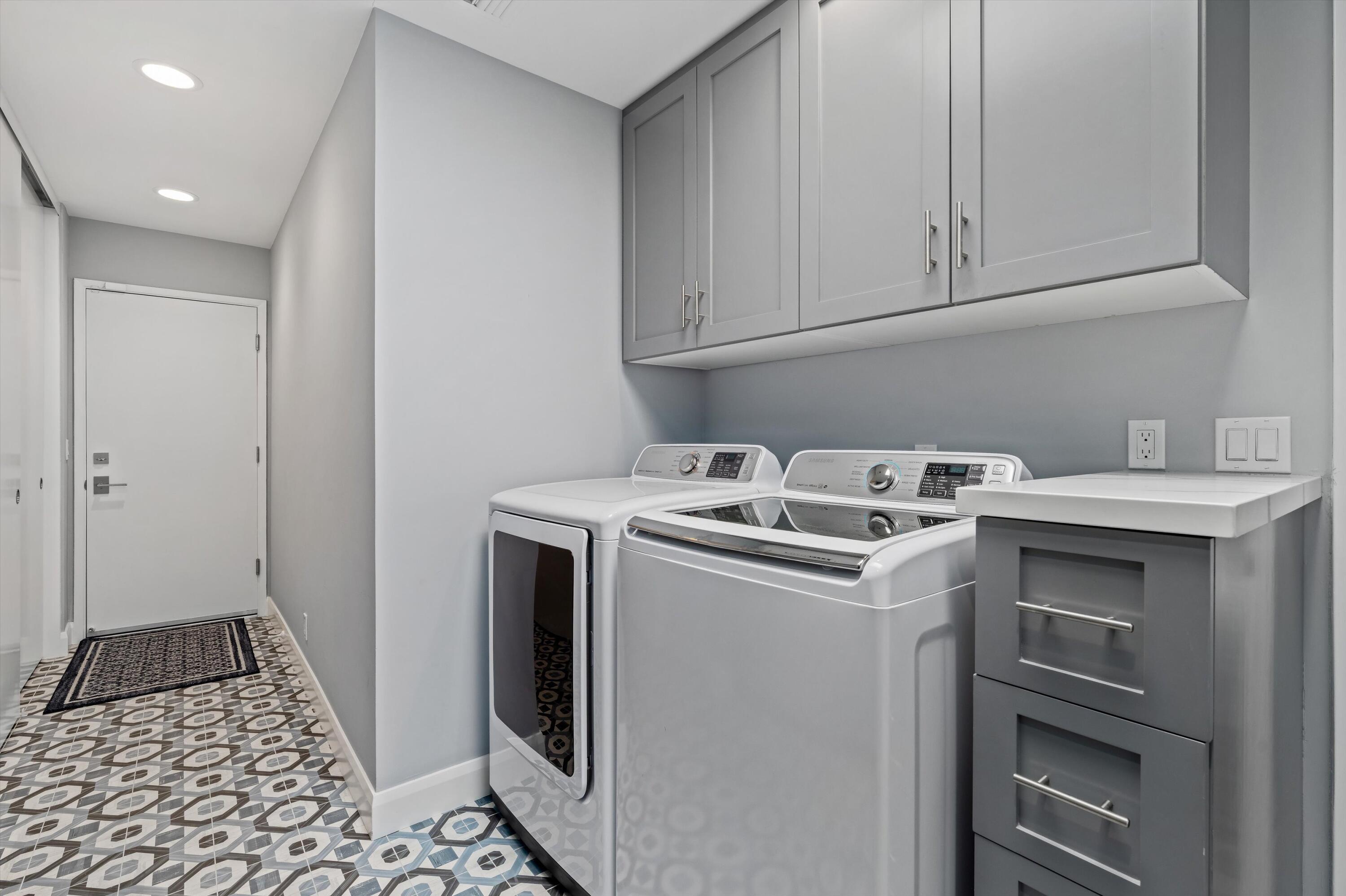 7 Wake Forest Court Rancho Mirage, CA 92270 - Photo 39 of 60 a utility room with dryer and washer