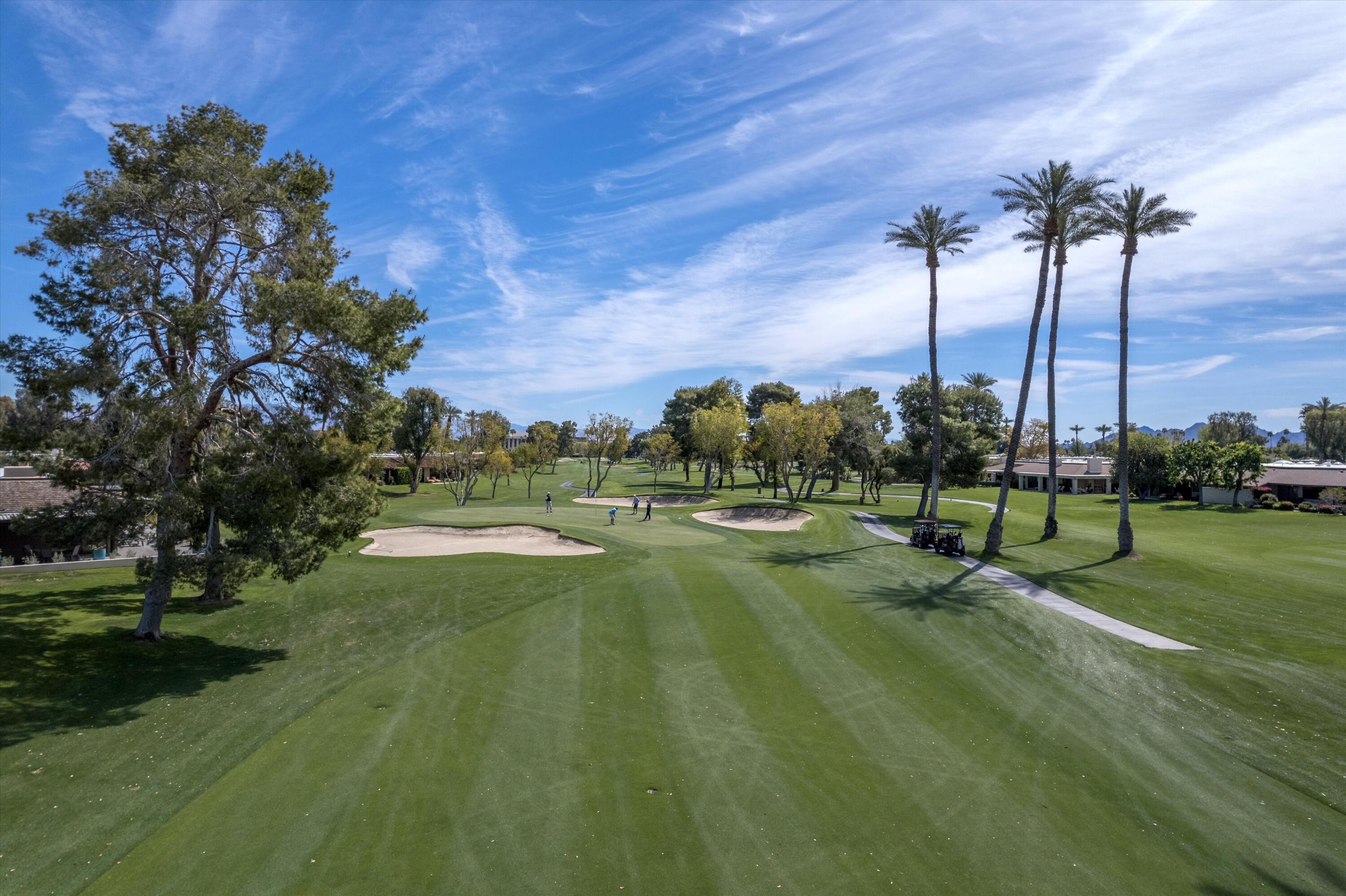 7 Wake Forest Court Rancho Mirage, CA 92270 - Photo 45 of 60 a view of a park with a palm tree