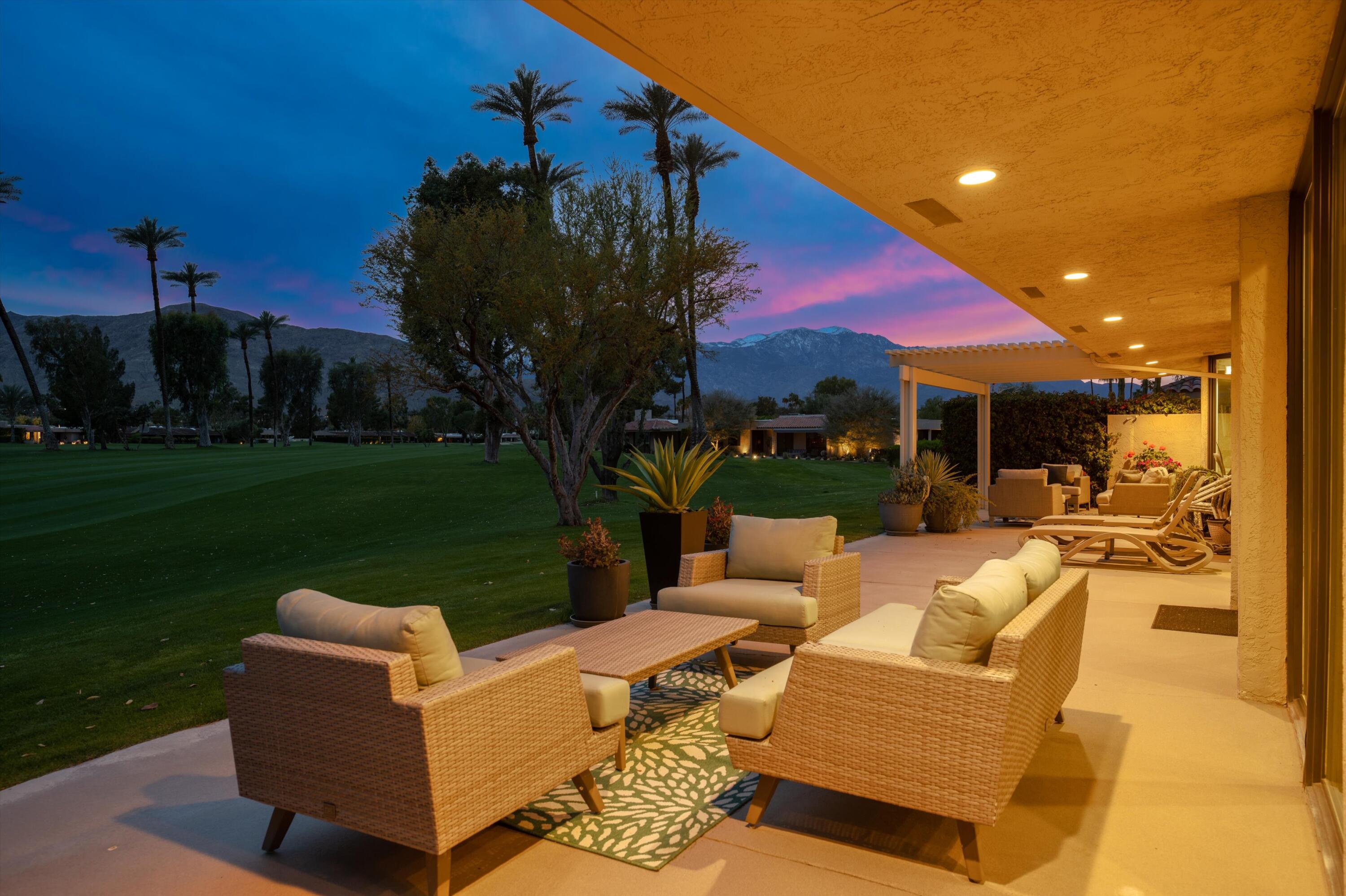 7 Wake Forest Court Rancho Mirage, CA 92270 - Photo 52 of 60 a view of a patio with couches table and chairs and potted plants