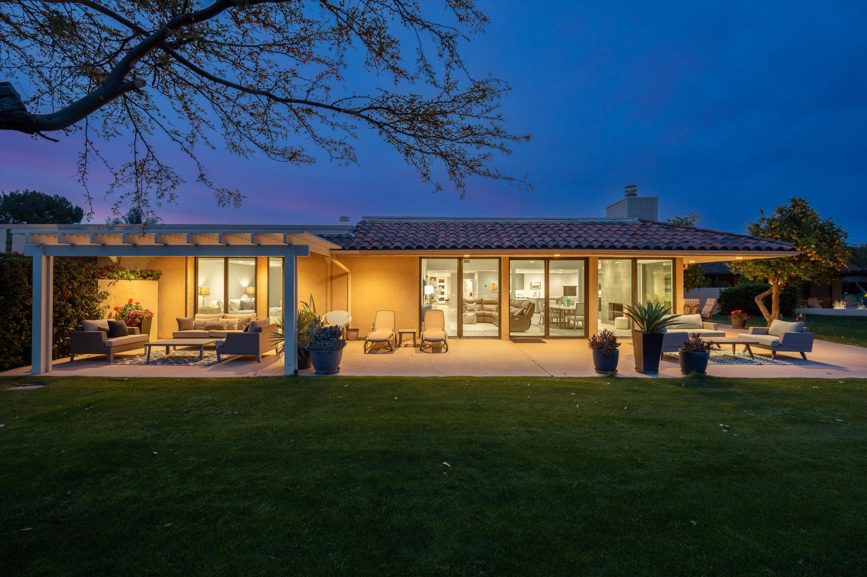 7 Wake Forest Court Rancho Mirage, CA 92270 - Photo 54 of 60 a house view with swimming pool and garden space