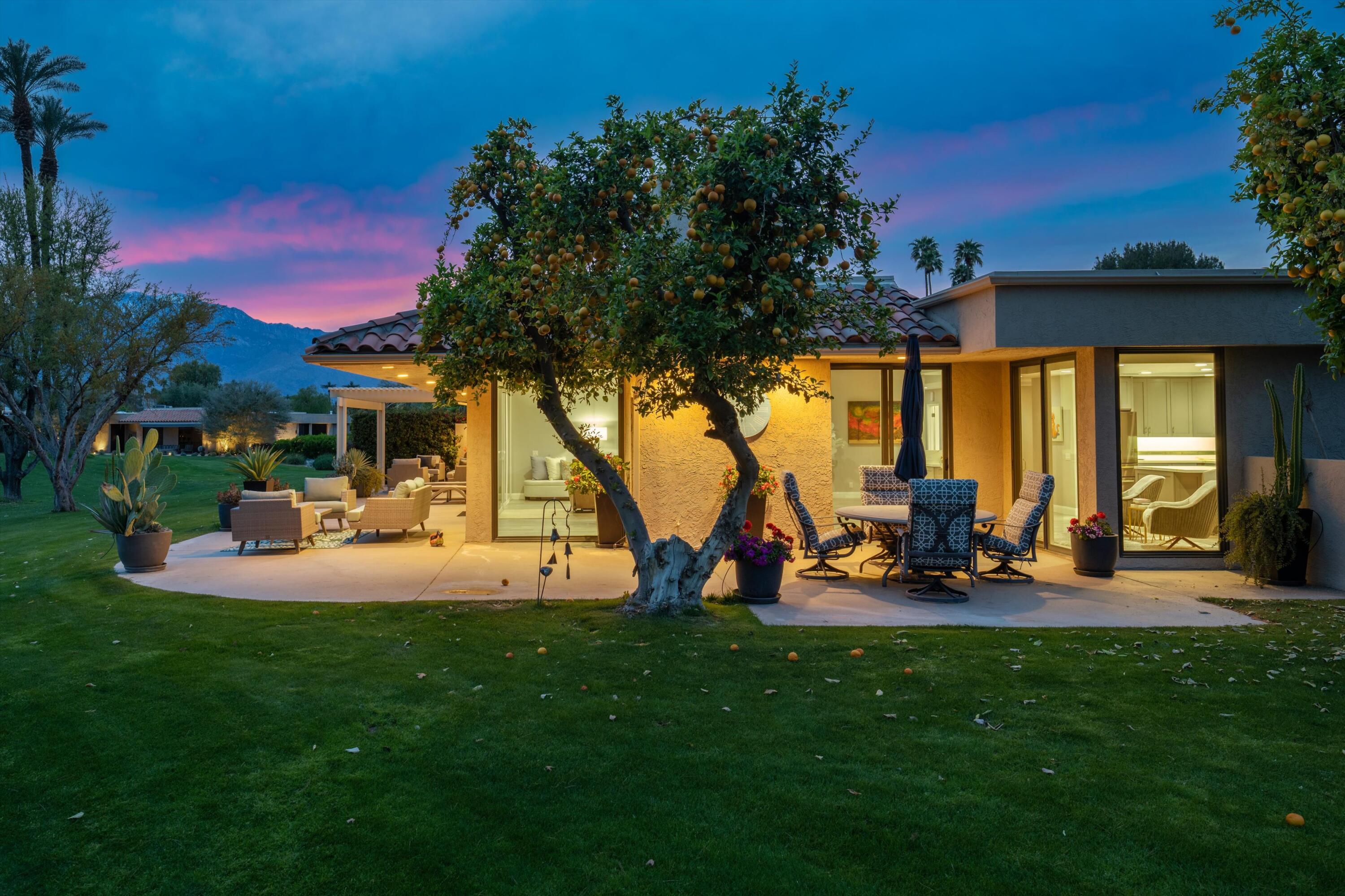 7 Wake Forest Court Rancho Mirage, CA 92270 - Photo 56 of 60 a view of a house with backyard porch and sitting area