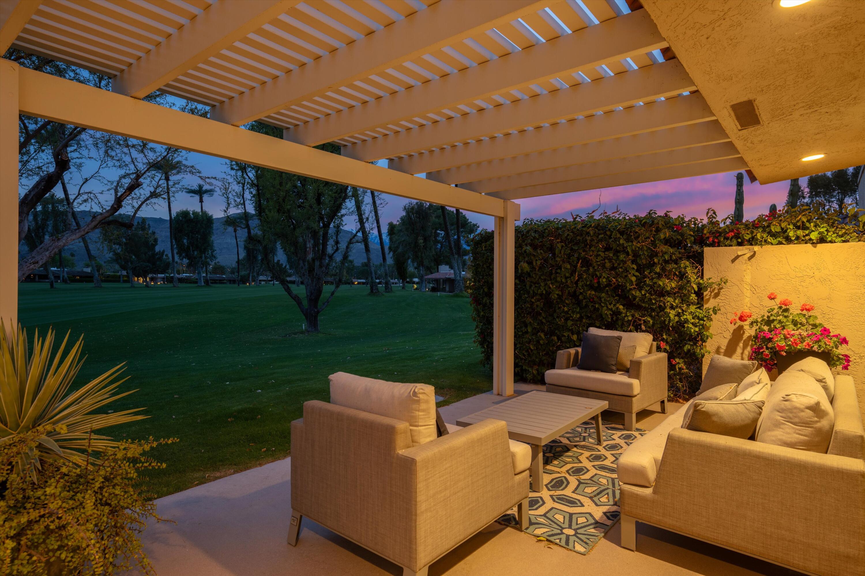 7 Wake Forest Court Rancho Mirage, CA 92270 - Photo 57 of 60 a outdoor living space with furniture and garden view