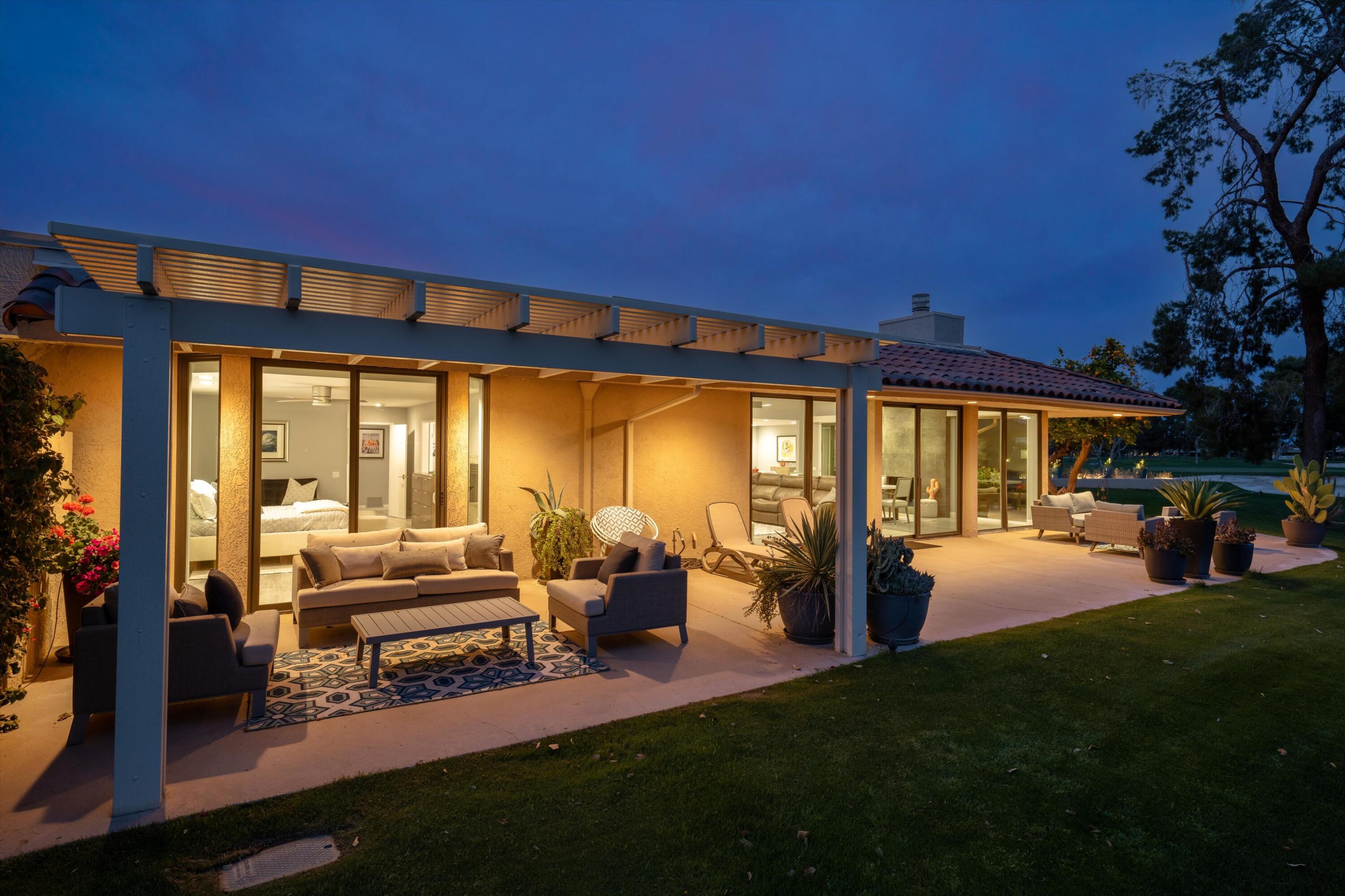 7 Wake Forest Court Rancho Mirage, CA 92270 - Photo 59 of 60 a view of living room with furniture and floor to ceiling window