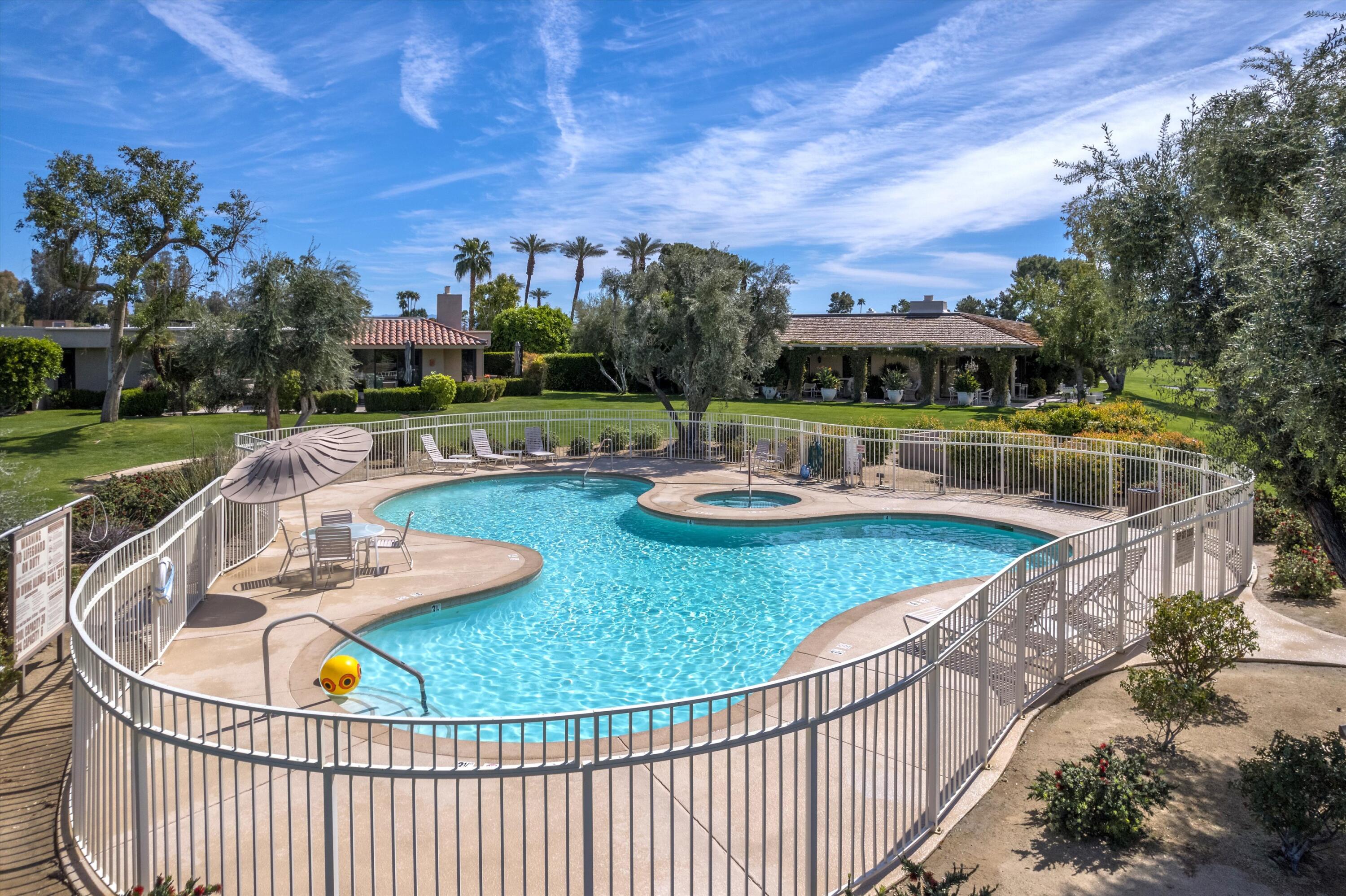 7 Wake Forest Court Rancho Mirage, CA 92270 - Photo 6 of 60 swimming pool view with a seating space
