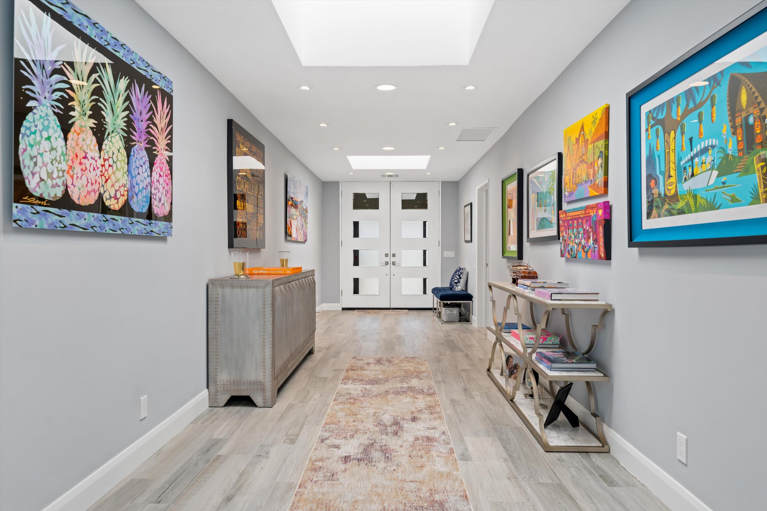 7 Wake Forest Court Rancho Mirage, CA 92270 - Photo 8 of 60 a view of a hallway with furniture and windows