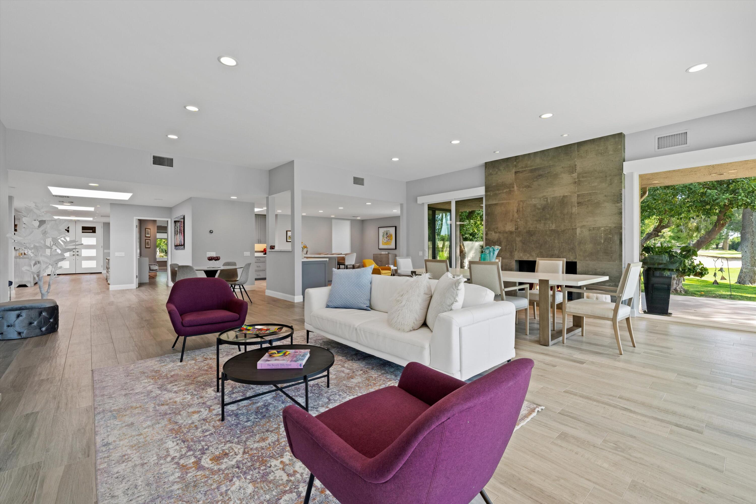 7 Wake Forest Court Rancho Mirage, CA 92270 - Photo 9 of 60 a living room with furniture kitchen view and a large window