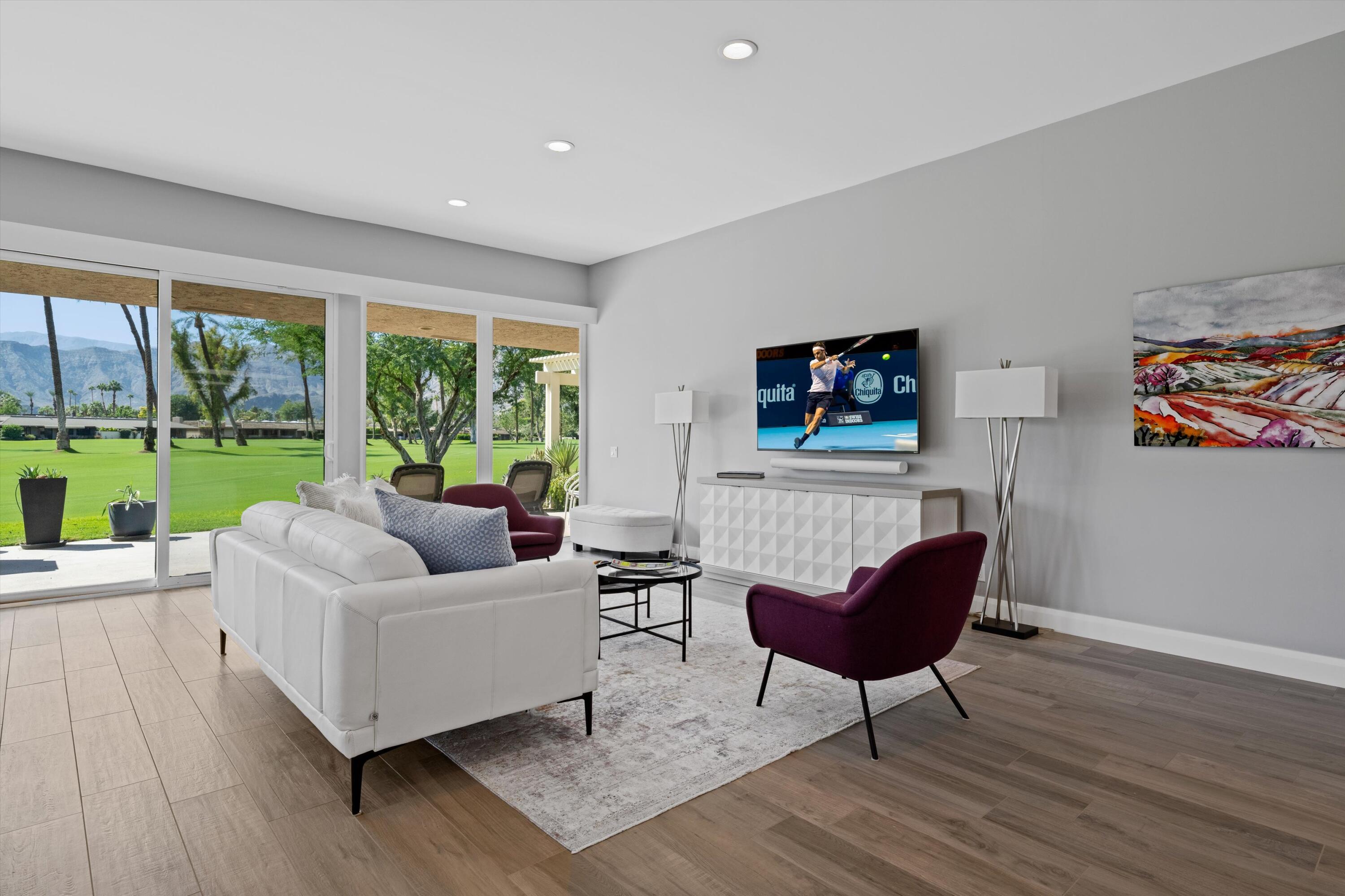 7 Wake Forest Court Rancho Mirage, CA 92270 - Photo 10 of 60 a living room with furniture and a large window