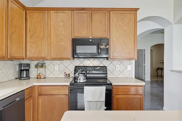 a view of living room with furniture and window