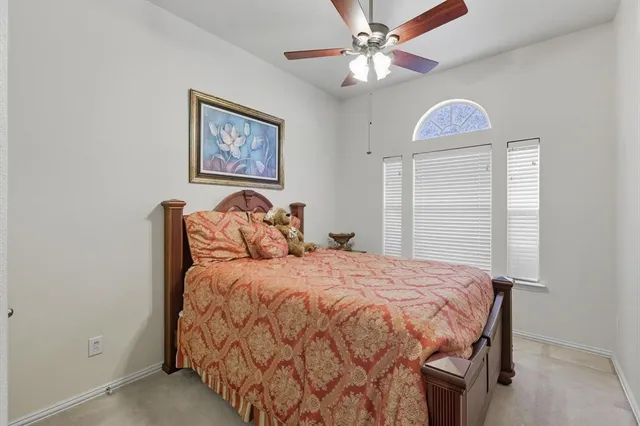 a living room with furniture a rug and a window