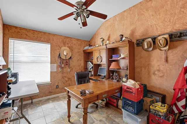 a room with furniture and a book shelf