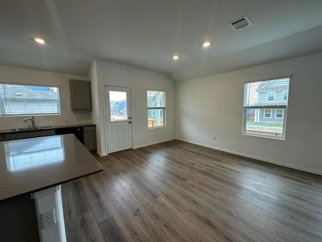 a view of an empty room and window