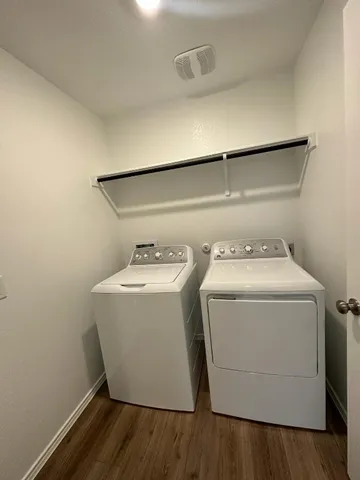 a utility room with dryer and washer