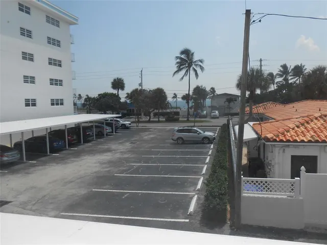 a view of a balcony with chairs