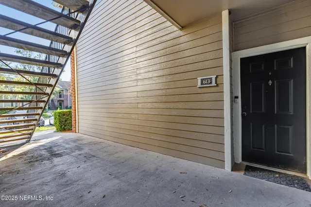 a view of a livingroom with furniture and rug