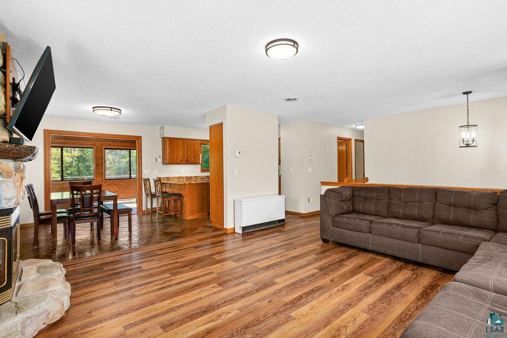 5370 Ugstad Road Hermantown, MN 55811 - Photo 31 of 68 Open concept living space featuring wood-finish flooring