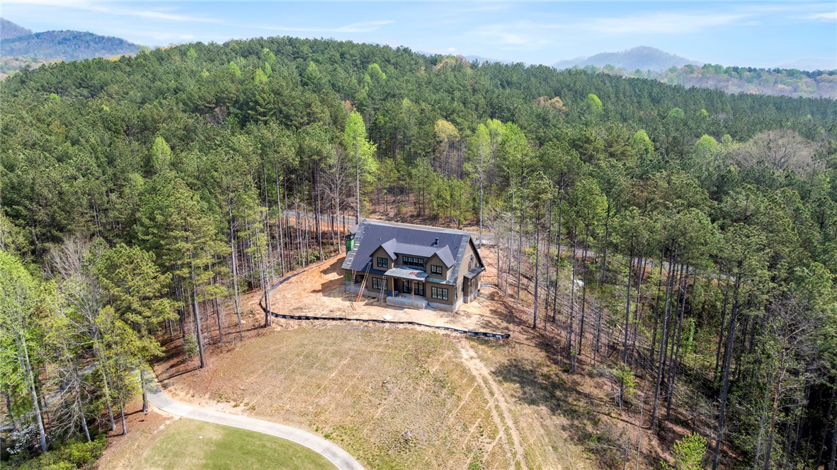 325 Keowee Avenue Sunset, SC 29685 - Photo 11 of 15 Perched amidst verdant hills, this home offers tranquil living and a picturesque setting.