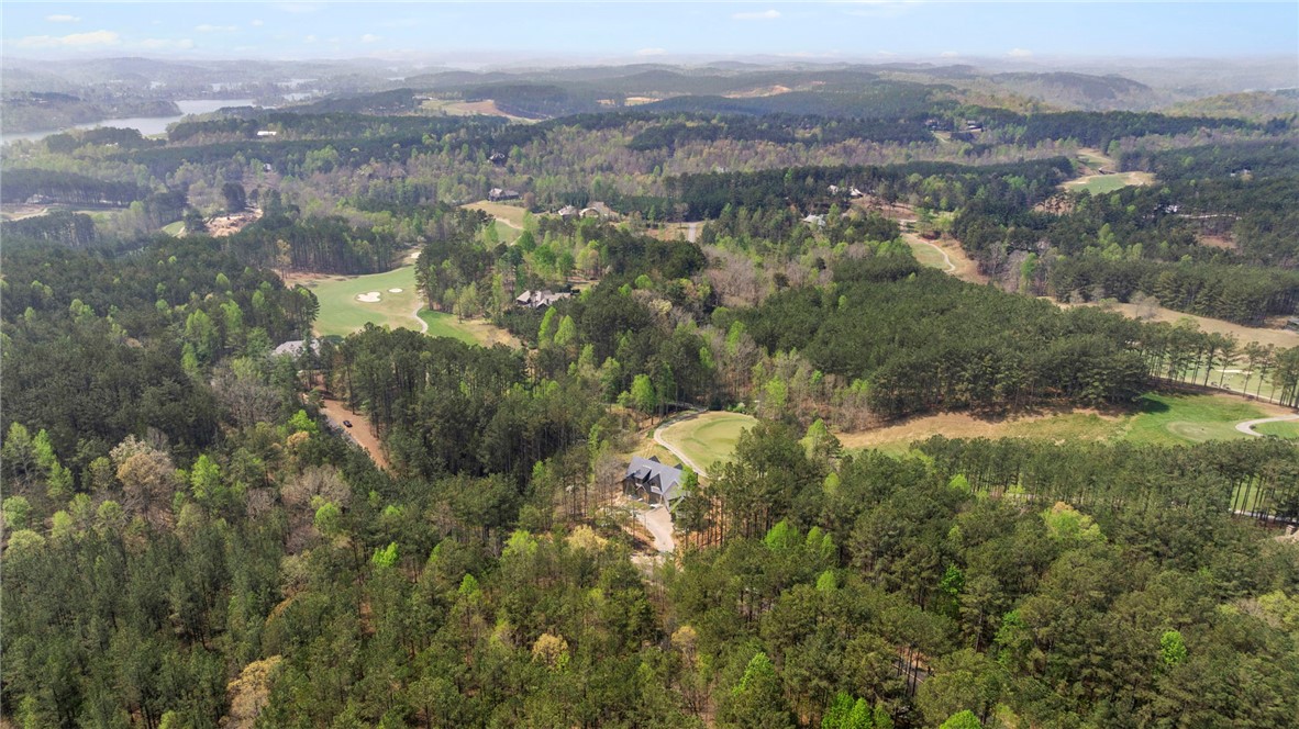 325 Keowee Avenue Sunset, SC 29685 - Photo 8 of 15 Panoramic views of lush landscapes, a serene lake, and a pristine golf course.