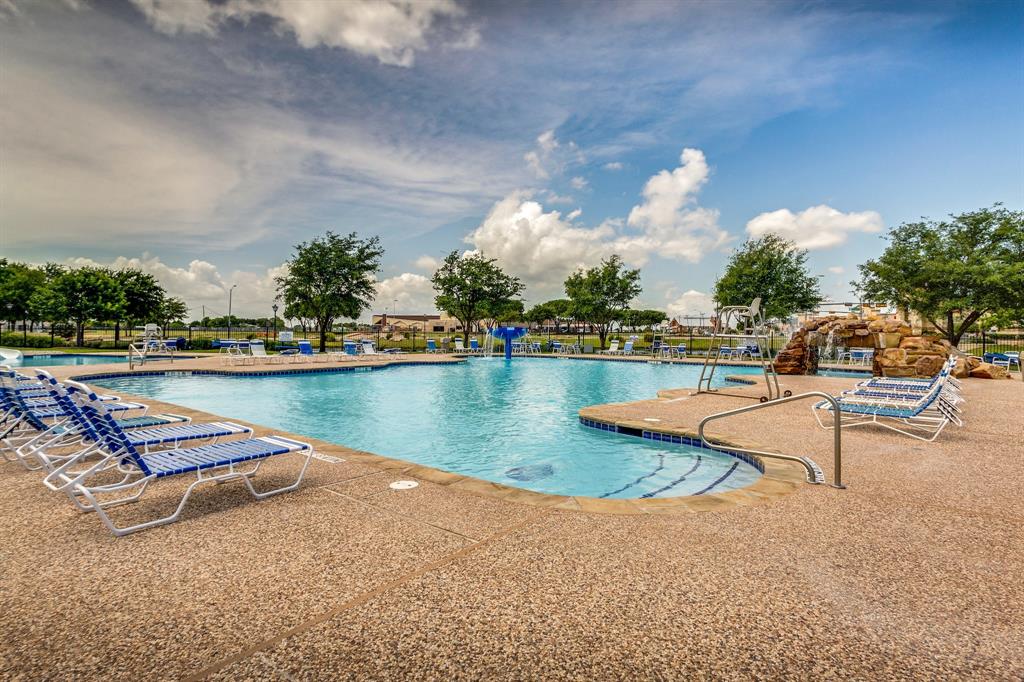 9217 Inverness Drive Rowlett, TX 75089 - Photo 38 of 40 Waterview Community Pool — The junior Olympic-sized pool creates a refreshing place to enjoy sunny North Texas days within the neighborhood.