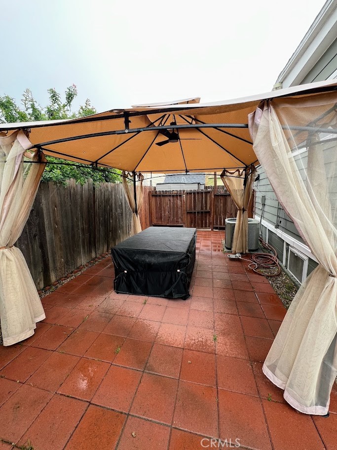 16600 Orange Avenue, Unit 124 Paramount, CA 90723 - Photo 14 of 16 a view of roof deck with table and chairs