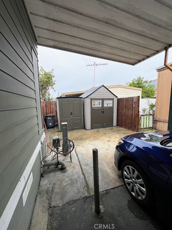 16600 Orange Avenue, Unit 124 Paramount, CA 90723 - Photo 15 of 16 a car parked in front of a house
