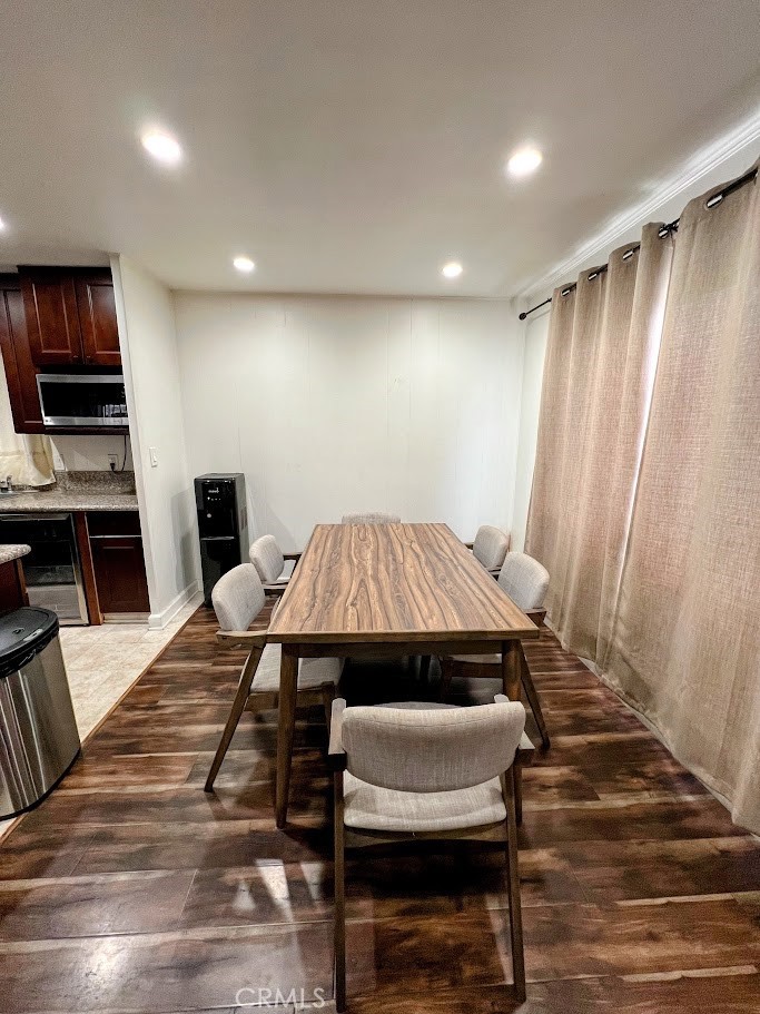 16600 Orange Avenue, Unit 124 Paramount, CA 90723 - Photo 5 of 16 a living room with a dining table and chairs