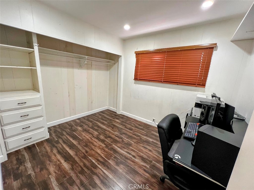 16600 Orange Avenue, Unit 124 Paramount, CA 90723 - Photo 9 of 16 a view of a workspace with furniture and a window