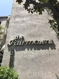 a view of a hallway with some plants