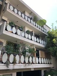 4255 West 5th Street, Unit 203 Los Angeles, CA 90020 - Photo 3 of 25 a front view of house with staircase