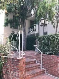 a view of car parked in front of building