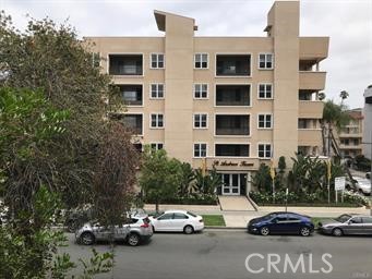 4255 West 5th Street, Unit 203 Los Angeles, CA 90020 - Photo 7 of 25 a view of car parked in front of building