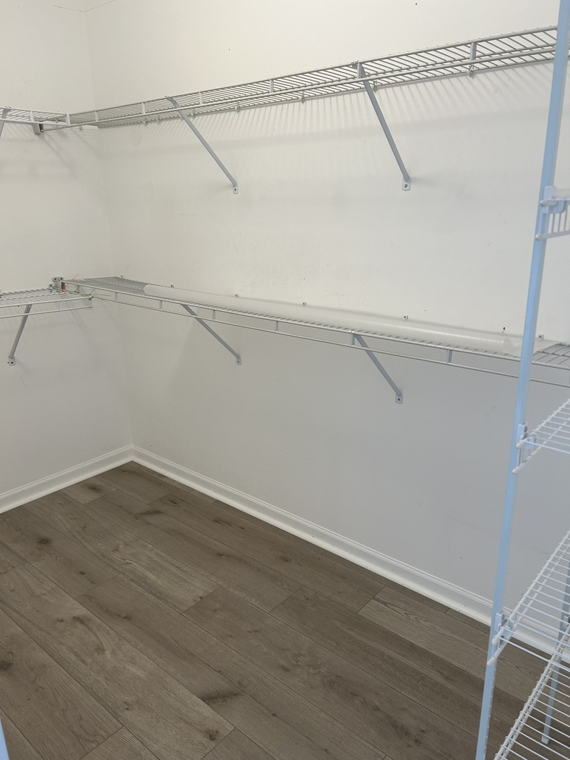 2005 Concord Drive McHenry, IL 60050 - Photo 9 of 12 a view of a room with racks on the wall