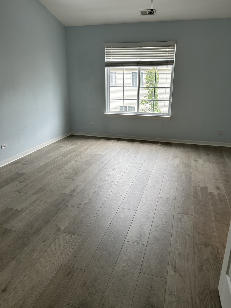 2005 Concord Drive McHenry, IL 60050 - Photo 10 of 12 an empty room with a window