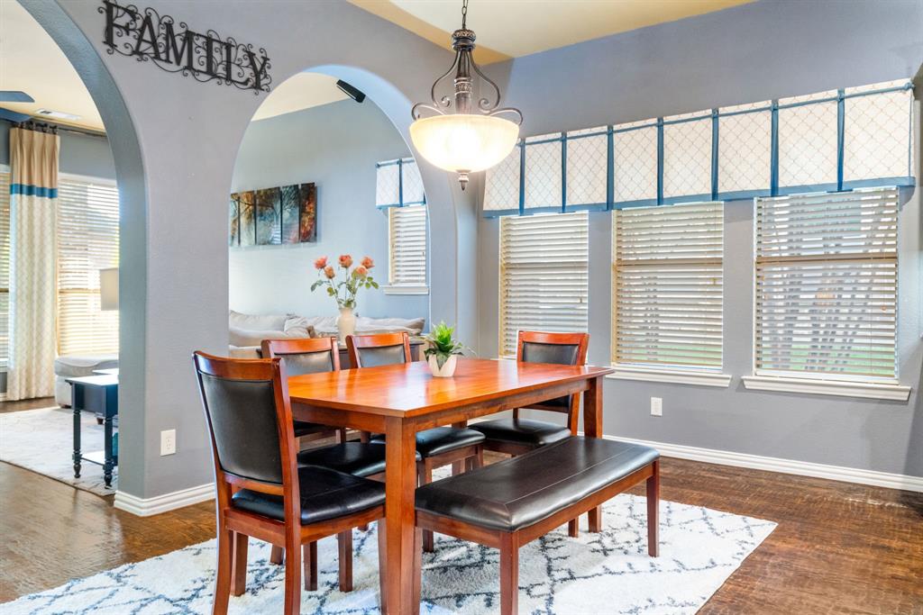 10138 Drawbridge Drive Frisco, TX 75035 - Photo 10 of 37 Opening effortlessly with views into the main living area—ideal for morning coffee or casual meals