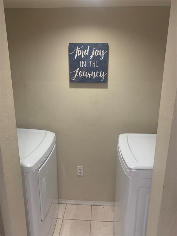 10764 70th Avenue, Unit 2301 Seminole, FL 33772 - Photo 4 of 19 a utility room with a sink