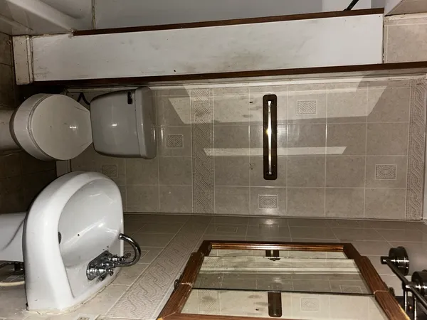 a bathroom with a sink and mirror