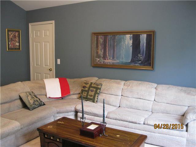 Here is a view of the upstairs bonus room.  To the left and the right of the picture, are two very spacious storage areas.  